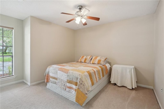 111 Thatcher Dr, Slidell, LA 70461 - carpeted bedroom with baseboards, ceiling fan, and a textured ceiling