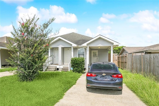 1925 Casa Calvo St, New Orleans, LA 70114 - view of front of property with asphalt driveway