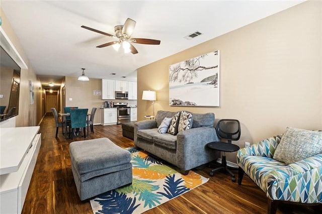 1925 Casa Calvo St, New Orleans, LA 70114 - living room featuring dark wood-style floors and ceiling fan