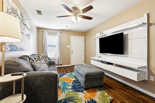 1925 Casa Calvo St, New Orleans, LA 70114 - living area with wood finished floors, ceiling fan, and baseboards