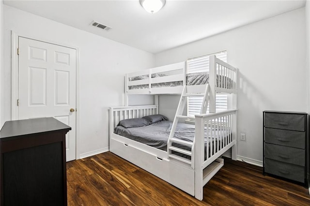 1925 Casa Calvo St, New Orleans, LA 70114 - bedroom featuring dark wood-style floors and baseboards