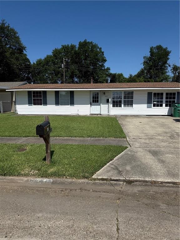 245 W Tish Dr, Avondale, LA 70094 - ranch-style home featuring a front yard and concrete driveway