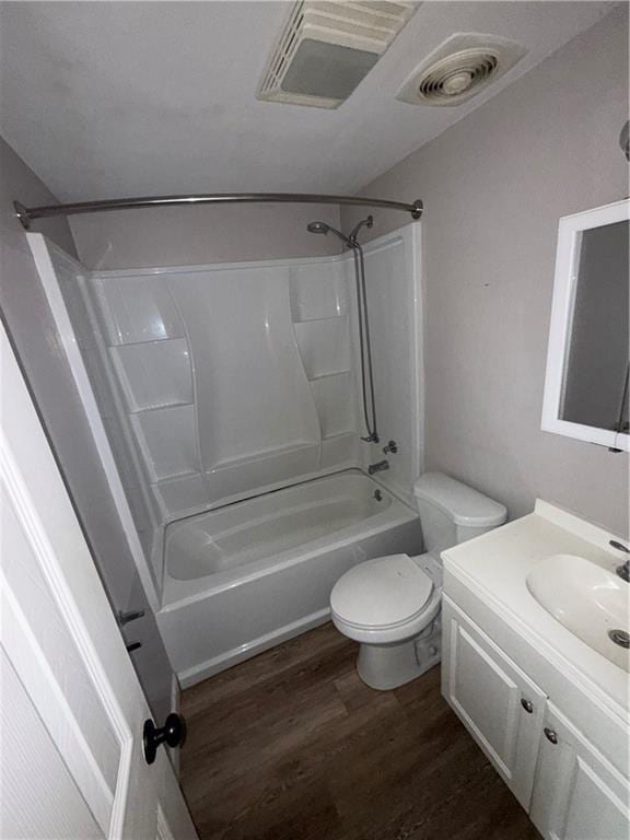 245 W Tish Dr, Avondale, LA 70094 - bathroom with wood finished floors, shower / washtub combination, vanity, and toilet