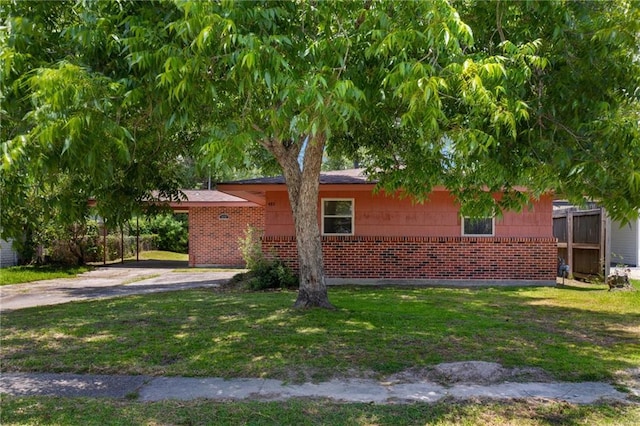 472 Cumberland Dr, Slidell, LA 70458 - view of side of property featuring brick siding and a yard