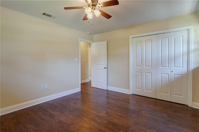 472 Cumberland Dr, Slidell, LA 70458 - unfurnished bedroom featuring wood finished floors, baseboards, a closet, and ceiling fan