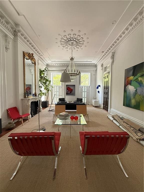 1456 Camp St, New Orleans, LA 70130 - living area featuring carpet flooring, ornamental molding, and a chandelier