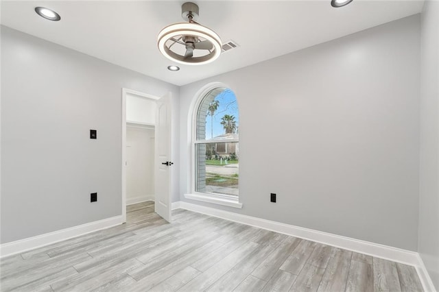 1938 W Homestead Dr, New Orleans, LA 70114 - empty room with light wood-type flooring, baseboards, and recessed lighting
