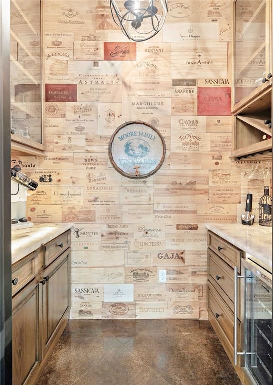 26 Hummingbird Rd, Covington, LA 70433 - bathroom featuring beverage cooler and vanity