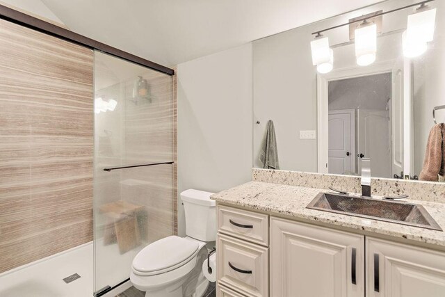 26 Hummingbird Rd, Covington, LA 70433 - bathroom with toilet, vanity, and a shower stall