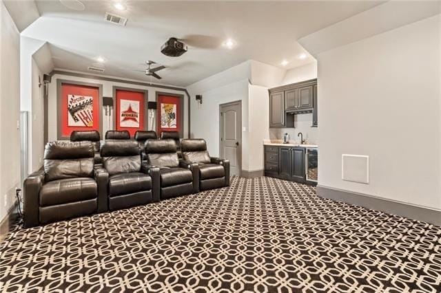 26 Hummingbird Rd, Covington, LA 70433 - home theater featuring baseboards, wet bar, carpet floors, and recessed lighting