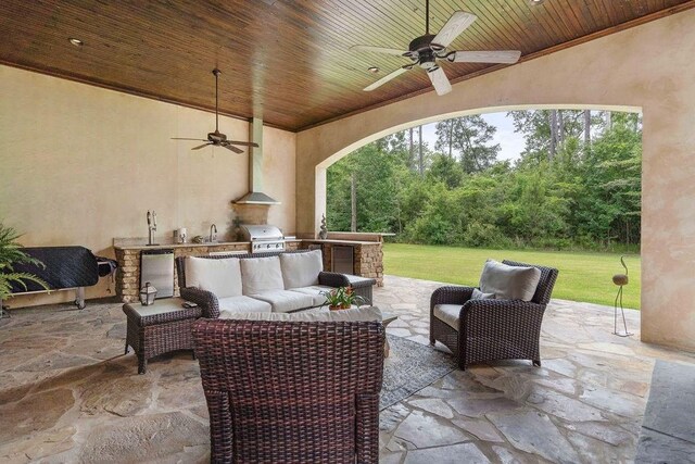 26 Hummingbird Rd, Covington, LA 70433 - view of patio featuring ceiling fan, an outdoor hangout area, and a sink