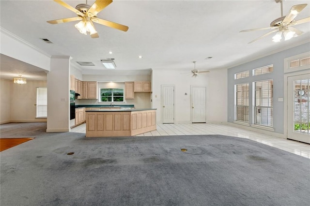 37112 Harper Ln, Pearl River, LA 70452 - kitchen featuring light brown cabinets, crown molding, light carpet, open floor plan, and a kitchen island
