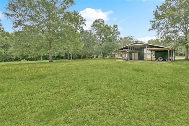 37112 Harper Ln, Pearl River, LA 70452 - view of grassy yard with view of wooded area