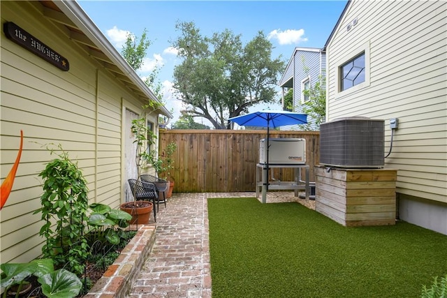 155 Alix St, New Orleans, LA 70114 - view of yard with cooling unit and a patio