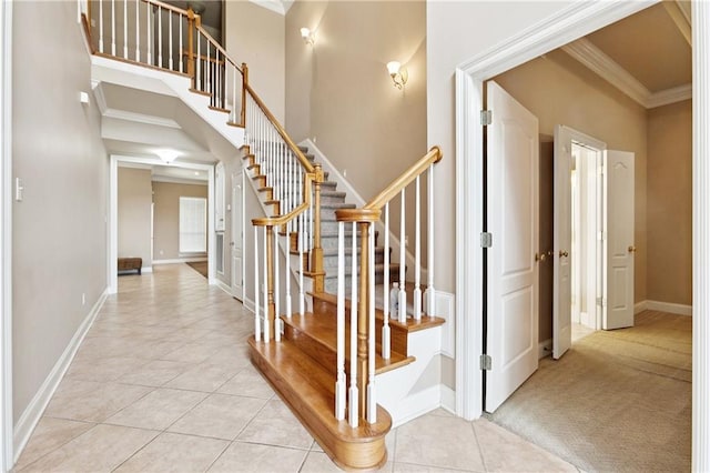 4908 Avron Blvd, Metairie, LA 70006 - stairs featuring crown molding and tile patterned floors