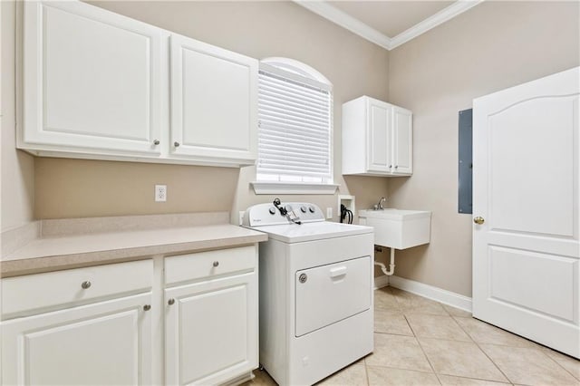 4908 Avron Blvd, Metairie, LA 70006 - laundry area featuring cabinet space, ornamental molding, separate washer and dryer, light tile patterned flooring, and electric panel
