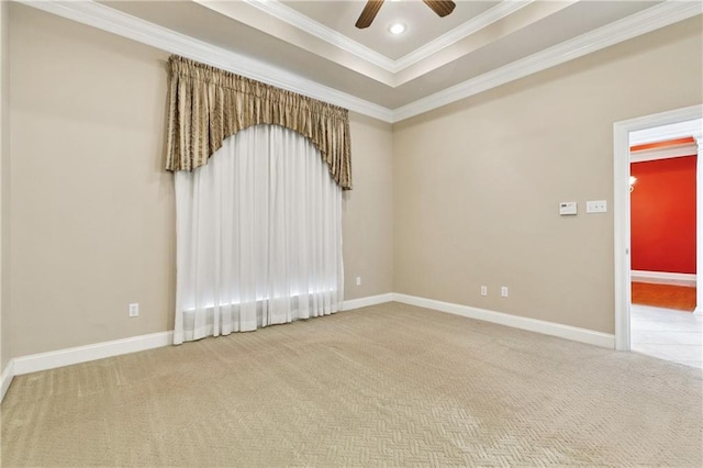 4908 Avron Blvd, Metairie, LA 70006 - carpeted empty room featuring crown molding, a ceiling fan, and a raised ceiling