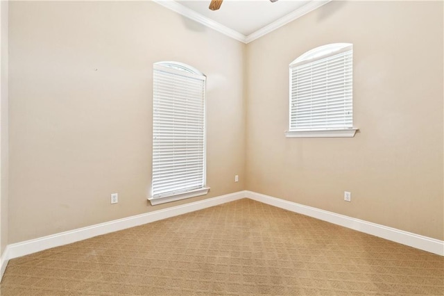 4908 Avron Blvd, Metairie, LA 70006 - empty room with crown molding, a ceiling fan, light carpet, and baseboards