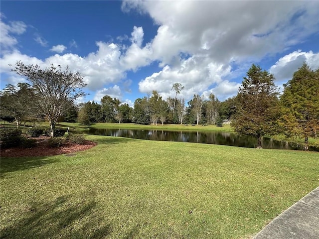 667 Highlands Dr, Slidell, LA 70458 - view of green lawn featuring a water view