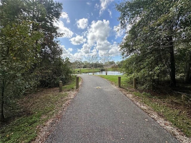 667 Highlands Dr, Slidell, LA 70458 - view of road featuring a water view