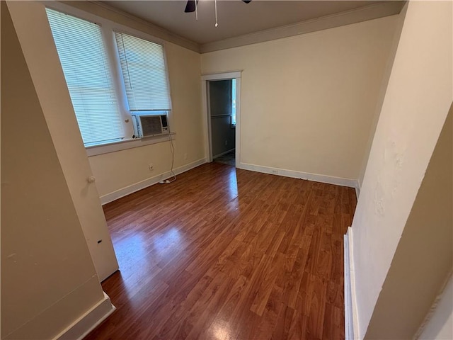 33739 Highway Dr, Jefferson, LA 70121 - spare room featuring wood finished floors, cooling unit, crown molding, and baseboards