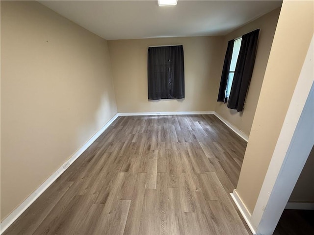 33739 Highway Dr, Jefferson, LA 70121 - empty room with wood finished floors and baseboards