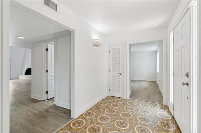 5117 Academy Dr, Metairie, LA 70003 - corridor featuring wood finished floors and baseboards
