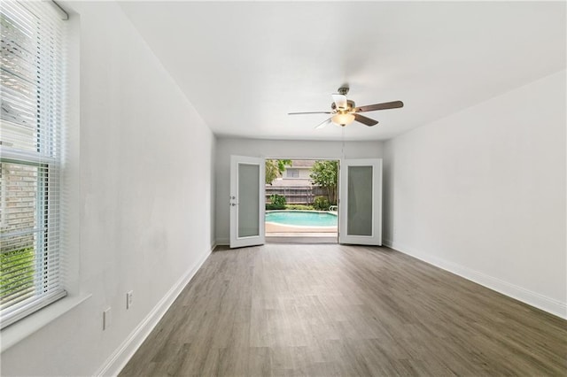 5117 Academy Dr, Metairie, LA 70003 - empty room with a ceiling fan and wood finished floors