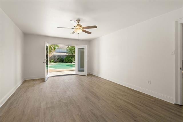5117 Academy Dr, Metairie, LA 70003 - empty room featuring ceiling fan and wood finished floors