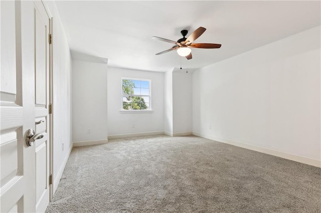 5117 Academy Dr, Metairie, LA 70003 - spare room featuring a ceiling fan and light carpet