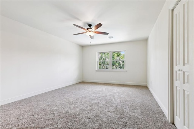 5117 Academy Dr, Metairie, LA 70003 - spare room with carpet flooring and ceiling fan