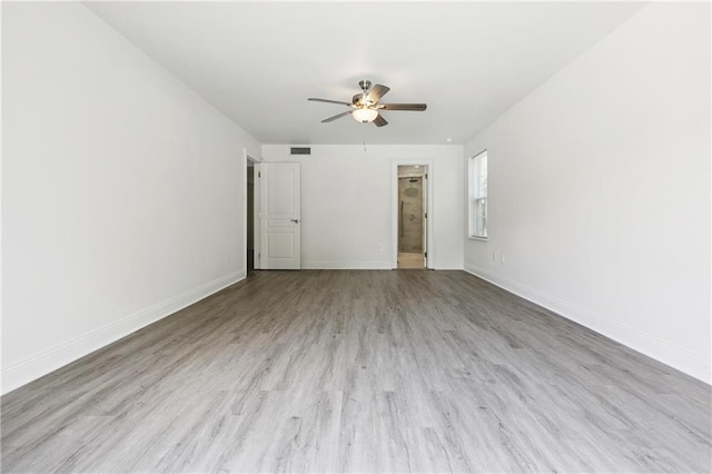 5117 Academy Dr, Metairie, LA 70003 - empty room with ceiling fan and wood finished floors