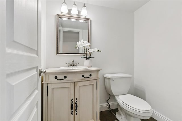 5117 Academy Dr, Metairie, LA 70003 - half bathroom with baseboards and vanity