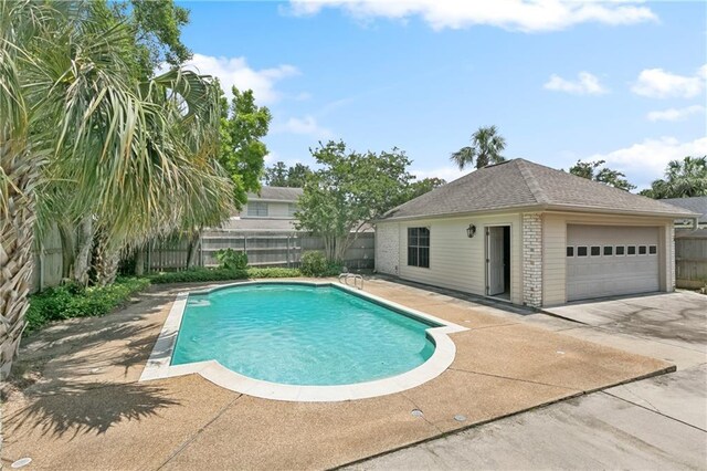 5117 Academy Dr, Metairie, LA 70003 - view of swimming pool featuring a fenced backyard and a patio