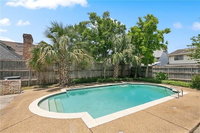 5117 Academy Dr, Metairie, LA 70003 - view of swimming pool with a fenced backyard and a patio