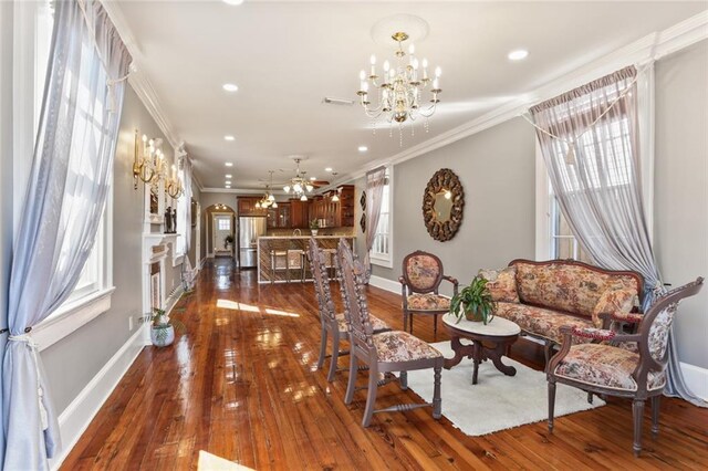 2720 New Orleans St, New Orleans, LA 70119 - living area featuring a chandelier, healthy amount of natural light, ornamental molding, baseboards, and recessed lighting