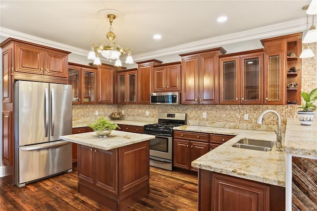 2720 New Orleans St, New Orleans, LA 70119 - kitchen with appliances with stainless steel finishes, a sink, light stone countertops, dark wood-type flooring, and ornamental molding