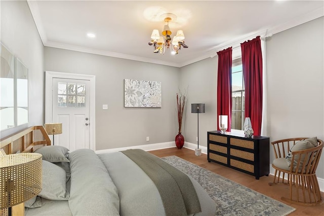 2720 New Orleans St, New Orleans, LA 70119 - bedroom featuring a chandelier, baseboards, wood finished floors, and crown molding