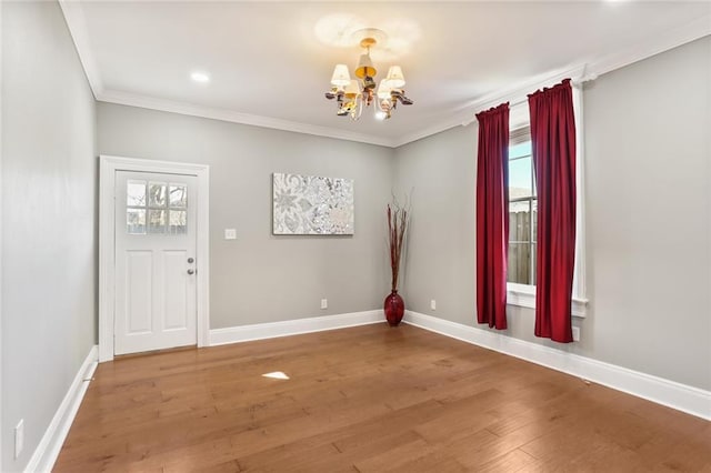 2720 New Orleans St, New Orleans, LA 70119 - foyer featuring a chandelier, wood finished floors, crown molding, baseboards, and recessed lighting