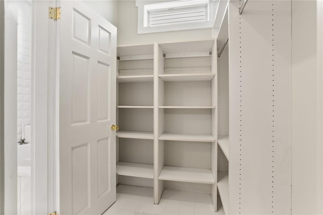 2720 New Orleans St, New Orleans, LA 70119 - walk in closet with tile patterned floors