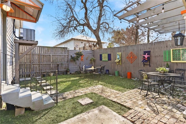 2720 New Orleans St, New Orleans, LA 70119 - view of yard with central AC, a pergola, a patio, and outdoor dining area