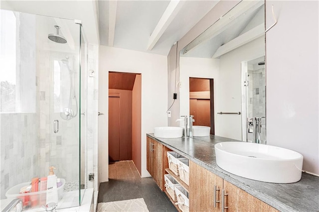1260 Esplanade Ave Unit 2, New Orleans, LA 70119 - bathroom featuring a stall shower, double vanity, and beamed ceiling