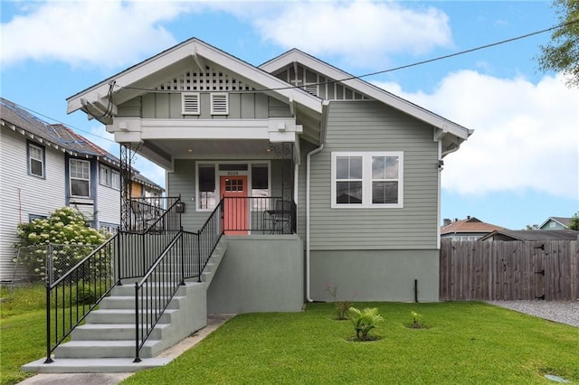 3225 Milan St, New Orleans, LA 70125 - view of front of house featuring covered porch, stairs, and board and batten siding