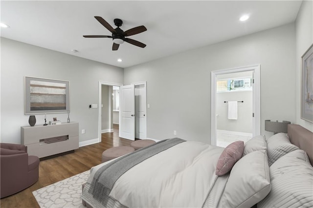 3225 Milan St, New Orleans, LA 70125 - bedroom with recessed lighting, connected bathroom, wood finished floors, baseboards, and a ceiling fan