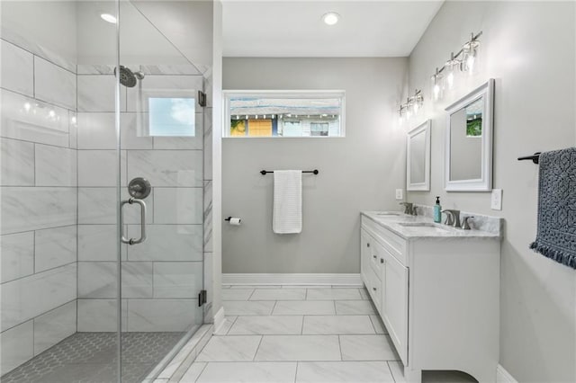 3225 Milan St, New Orleans, LA 70125 - full bathroom with marble finish flooring, double vanity, a stall shower, baseboards, and recessed lighting