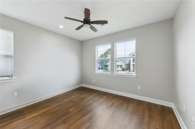 3225 Milan St, New Orleans, LA 70125 - empty room featuring dark wood-style floors, baseboards, a ceiling fan, and recessed lighting