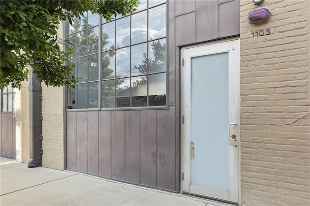 1103 Tchoupitoulas St Unit 102, New Orleans, LA 70130 - property entrance featuring brick siding
