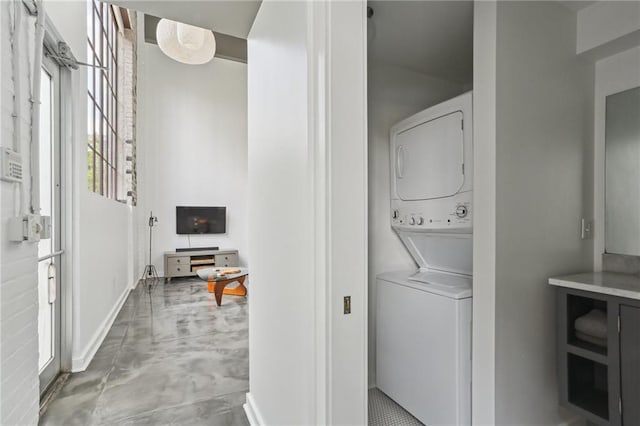 1103 Tchoupitoulas St Unit 102, New Orleans, LA 70130 - laundry area with stacked washing machine and dryer