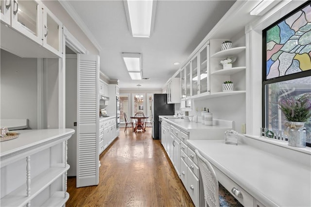 1029 Beverly Garden Dr, Metairie, LA 70002 - kitchen featuring a sink, white cabinetry, dark wood finished floors, open shelves, and crown molding