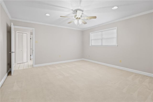 1029 Beverly Garden Dr, Metairie, LA 70002 - unfurnished room featuring light carpet, ceiling fan, ornamental molding, baseboards, and recessed lighting